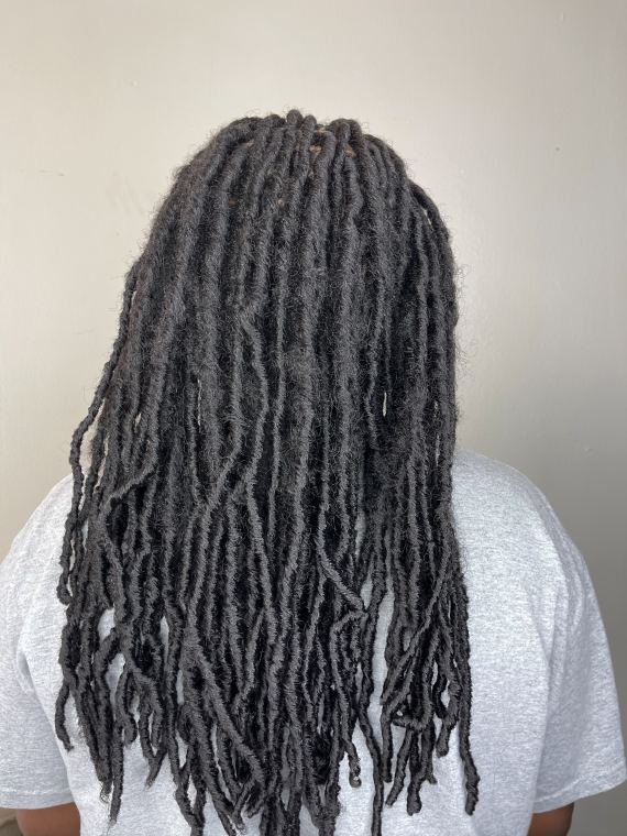 Long locs falling down the back
