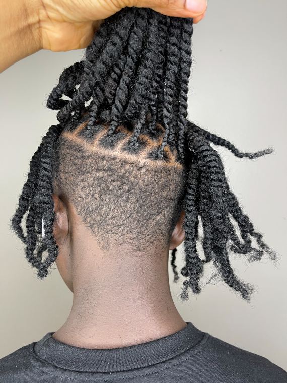 Two-strand twists over a clean fade, back view